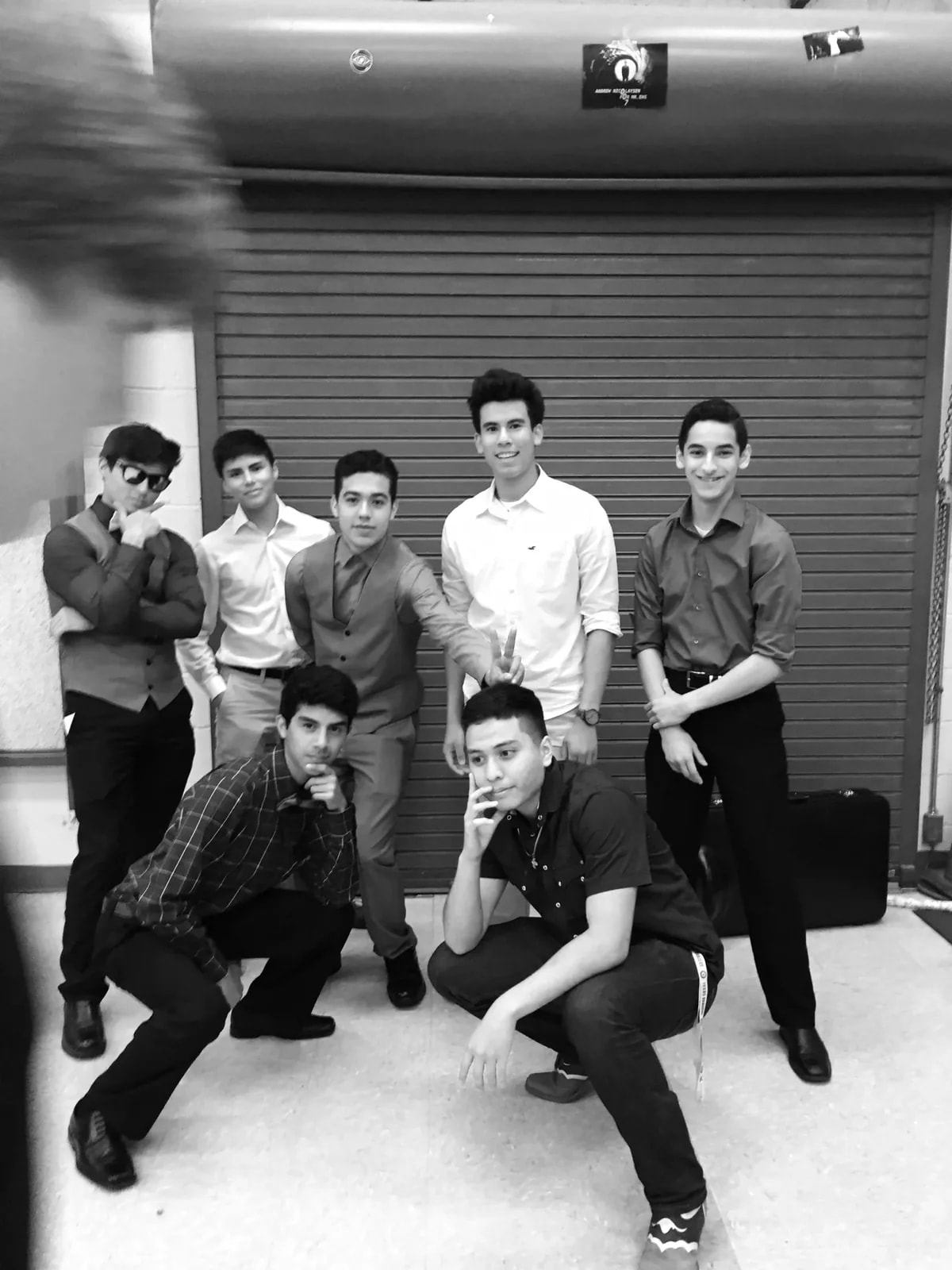 Claudio Romero and friends in the Ennis High School band hall