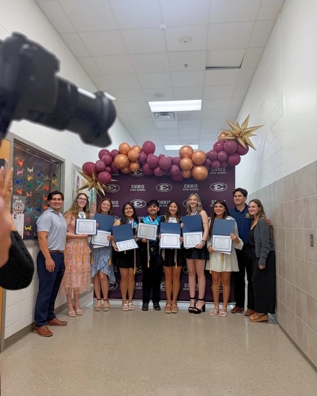 Students and community members celebrating at Ennis High School